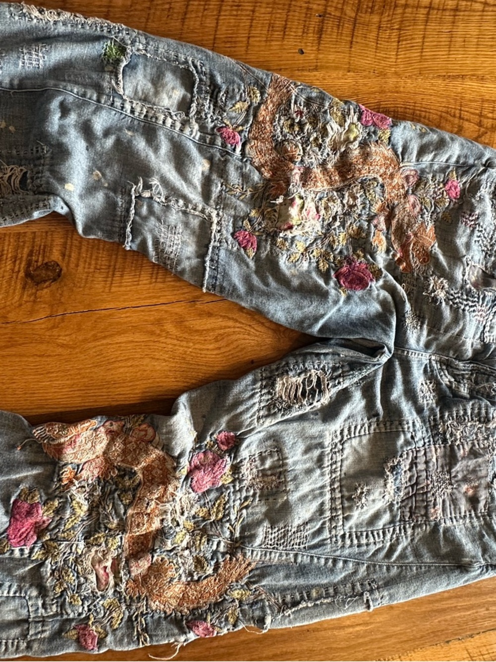 Magnolia Pearl Distressed Embroidered Blue Jeans with Pink & Tan Accents